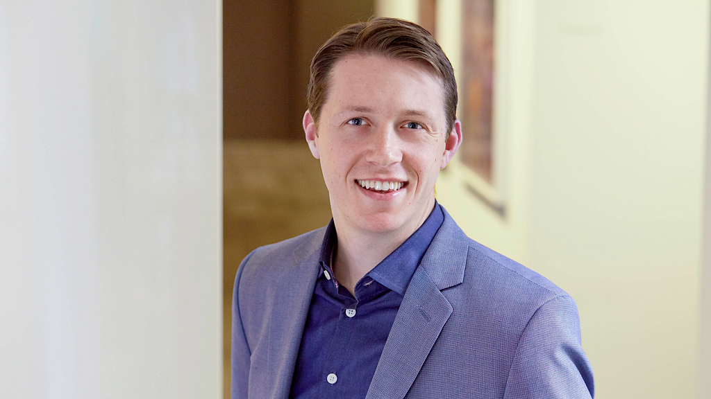 A man smiling for the camera.